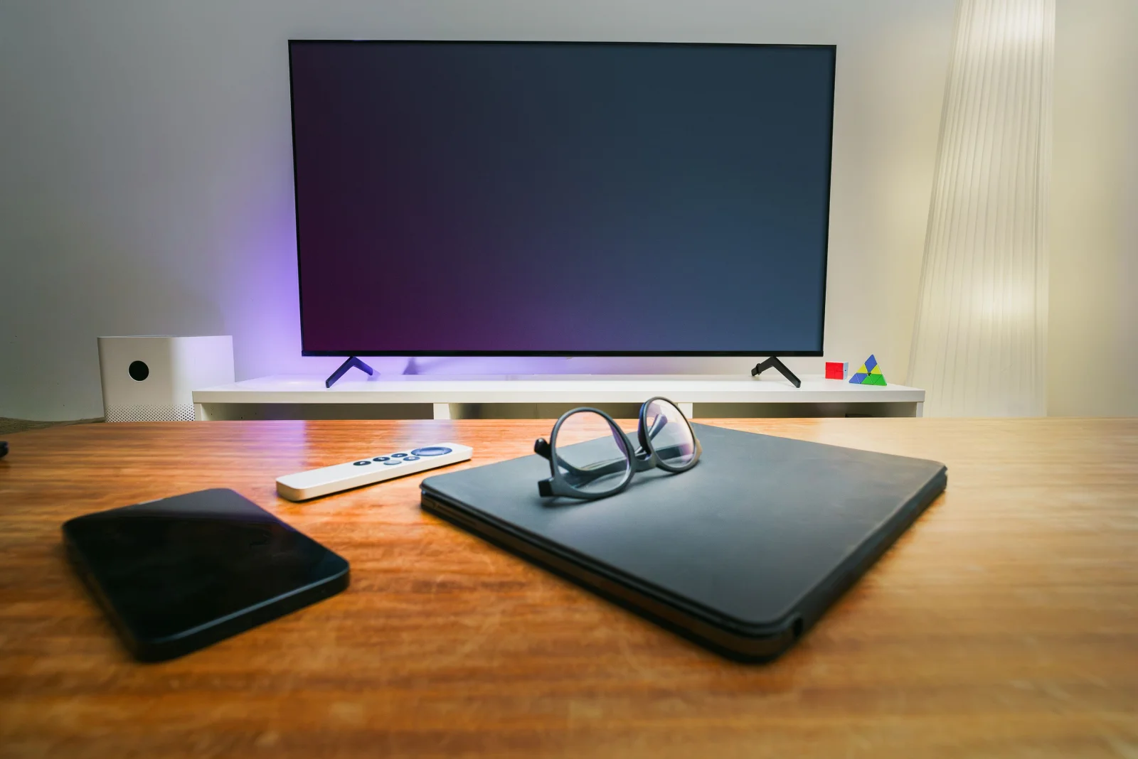 A smart TV displaying a computer desktop interface, showcasing versatility.