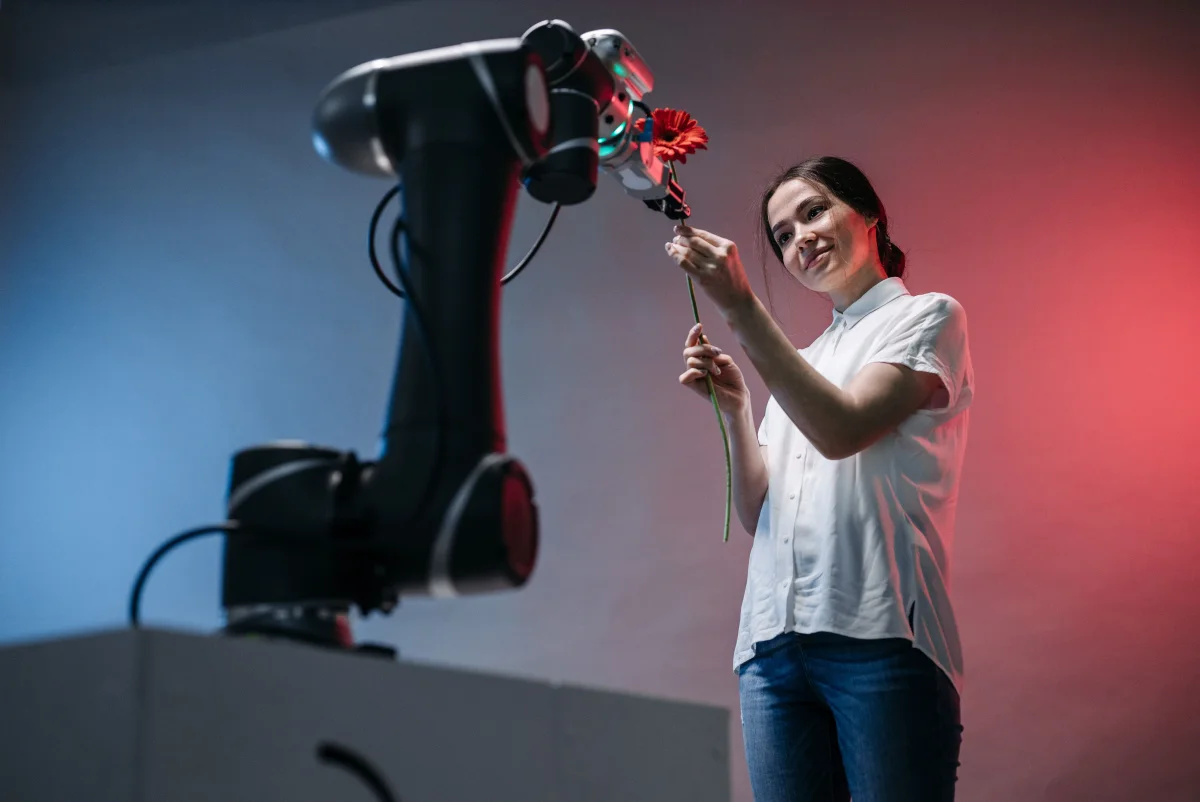 Robotic arm assembling electronics