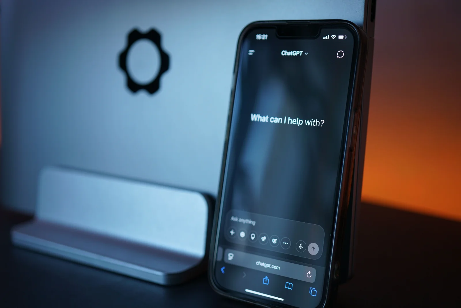 A futuristic workspace with an AI assistant interface
