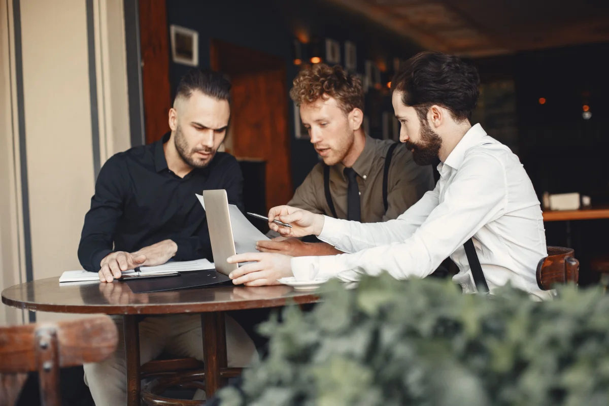 Customers interacting with startup representatives