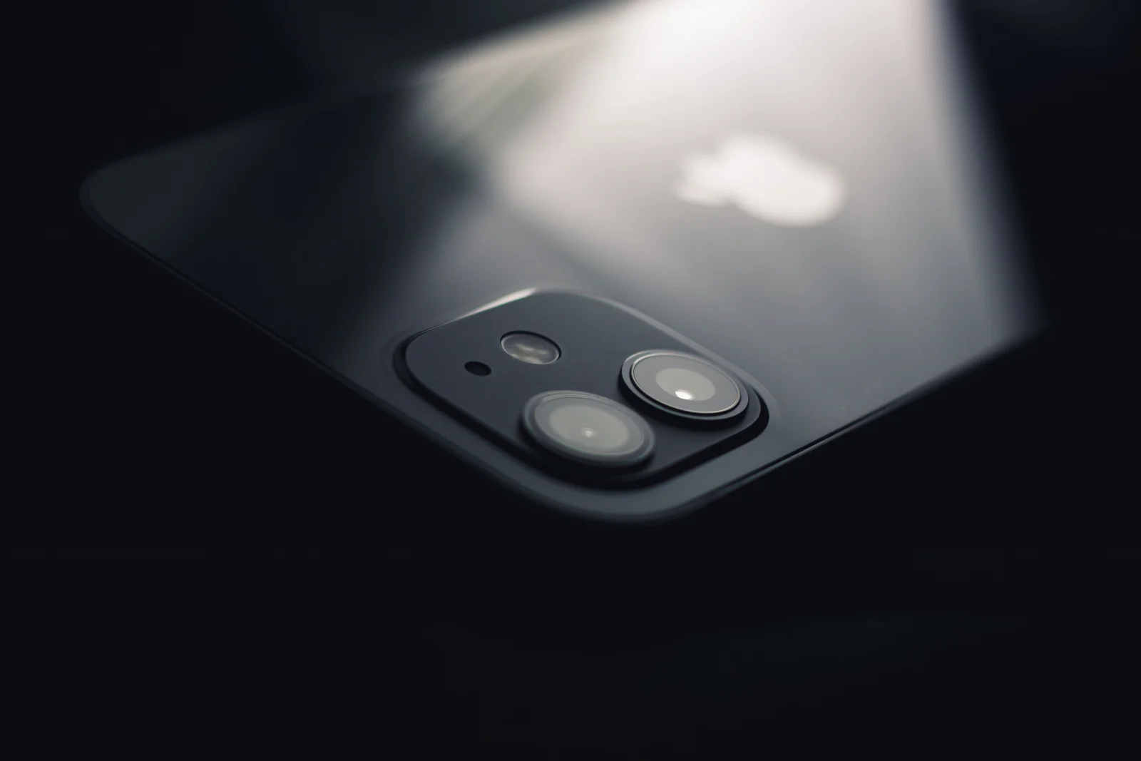 Illustration of digital storm over Apple devices